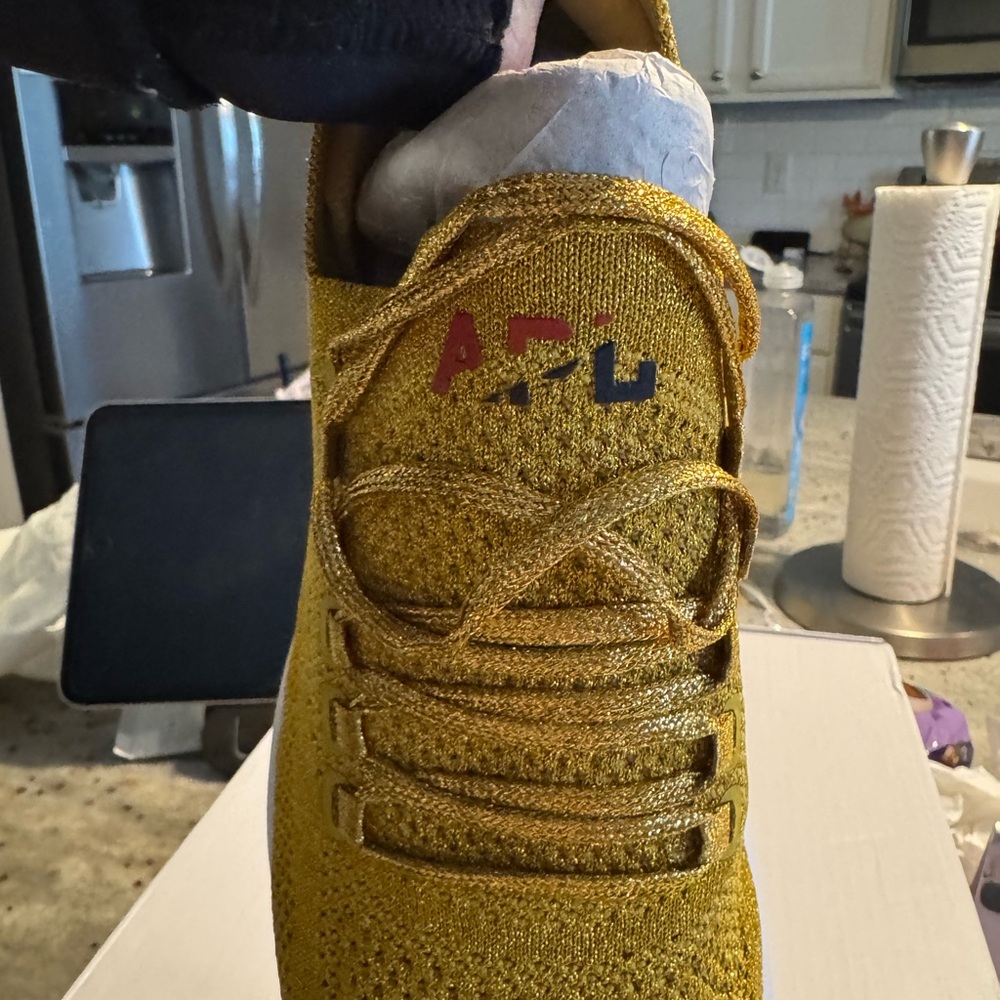APL Women's Sneakers in Gold with Red and Blue Accents - Picture 1 of 9